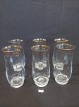 JOGO COM 6 COPOS PARA ÁGUA/SUCO EM CRISTAL FACETADO  COM BORDA  DOURADA, APRESENTA PERDAS NO DOURADO DA BORDA. MEDIDA: 6 CM D X 14 CM DE ALTURA