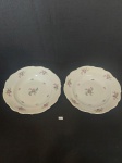 2 PRATOS FUNDOS EM PORCELANA POLONESA TIELSCH WALBRZYCH COM DECORAÇÃO FLORAL FRISO DOURADO E BORDAS ONDULADAS,COM BICADO NA PARTE DE TRÁS. MEDIDA: 25 CM D
