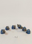 6 MINIATURAS REPRESENTANDO  BUMBA MEU BOI  EM BARRO COZIDO, PINTADO NOS TONS DE AZUL, CINZA, AMARELO E BRANCO, APRESENTA MARCAS DO TEMPO 2 COM AVARIA NA ORELHA.MEDIDA: 2,5 CM DE ALTURA X 4,5 CM DE COMPRIMENTO