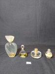 LOTE COM 4 VIDROS DE PERFUME  USADOS EM DIVERSOS  TAMANHOS E MODELOS, SENDO 1 ELYSIUM, 1 FIRST PARIS,  1 BR, E 1 COM LIGUIDO DOURADO. MEDIDA: MAIOR 10,5 CM DE ALTURA, MENOR 4 CM DE ALTURA