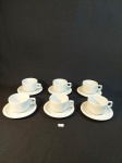 JOGO COM 6 XÍCARAS DE CAFÉ EM PORCELANA BRANCA. MEDIDA: XÍCARA 6,5 CM D X 4,5 CM DE ALTURA, PIRES 11 CM D