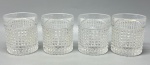 CRISTAL - Conjunto de 4 pesados copos para whisky decorado em relevo no estilo bico de jacá. Med. 9 cm.