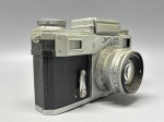 COLECIONISMO - Antiga câmera fotográfica de filme 35mm, modelo Kiev-4AM, fabricada na década de 1940. Vem com capa protetora original em couro com alças em excelente estado. Não testada e sem garantia.