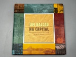 LIVRO - UM BALCÃO NA CAPITAL - Capa dura. No estado.