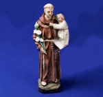 ARTE SACRA - Europa, s/ datação. "Santo Antônio com Menino Jesus" -  Antiguidade. Peça em faiança policromada. Mede 18 cm de altura e base de 8 x 8 cm.