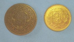 2 moedas Estrangeiras !! exóticas peças de local Marrocos e Markkaa !! ambas em material Bronze aluminio !! acervo de colecionador !!