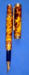  Caneta - Coleção Agostini !! Pena tinteiro !! Iridiun/ Germany !! Cor Marron tipo Marmorizada !!  !! Acervo de colecionador !! Sem carga , Só colocar carga tipo descartavel   !!   !! 