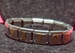 Semi - Joia , pulseira masculina em Material aço , com nome Gravado, VITOR  cada letra em Ouro !! linda peca ...