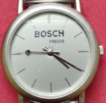Relógio - Marca  Promocional BOSCH Freios !! Pulseira metalica !! Made in Japan !!!  !! ! Precisa revisão ou conserto  !! Muito tempo parado , acervo de colecionador !! Modelo promocional !!