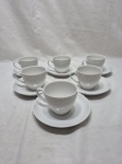 (6BL)Jogo de 6 xícaras de chá em porcelana branca com relevos.