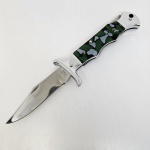 Antiga faca de mão na cor verde. Mede aproximadamente 21x5 cm.