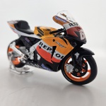 Miniatura moto Diecast Honda RC212V cor  laranjado, mede aproximadamente 11x6 (sem caixa).