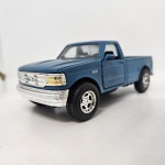 Miniatura picape Fprd F-150 de 1979 na cor azul, mede aproximadamente 16x6, No estado (sem caixa).