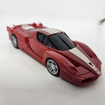 Miniatura de plástico, Ferrari FXX, na cor vermelho, modelo com sonorização. Coleção Shell V-Power. Mede aproximadamente 10x3. No estado (sem caixa).