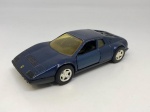 Miniatura de carrinho em metal da FERRARI 1973-365GTS4 - Esc: 1:38 . Mede: 12 cm . Marcas de uso.