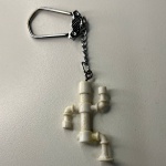 Chaveiro bonequinho de canos