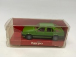 Miniatura de carrinho de maquete Harpa modelo Ford Escort, verde claro. Na embalagem, mede aproximadamente 2x6 cm.