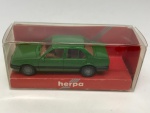 Miniatura de carrinho de maquete Harpa modelo Ford Escort, verde escuro. Na embalagem, mede aproximadamente 2x6 cm.