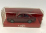 Miniatura de carrinho de maquete Harpa modelo Ford Escort, vinho. Na embalagem, mede aproximadamente 2x6 cm.
