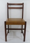DESIGN - Cadeira dos anos 50 em jacarandá com encosto vazado e assento forrado em couro sintético. Selo de Irmãos HOROVITZ.  Med.: 84x43x43 cm.