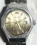 ORIENT - Elegante e raro relógio de pulso japonês, modelo feminino, automatico, com caixa e pulseira em aço. Funcionando no momento e sem garantias futuras. Med 2,5 cm (Caixa).