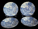 WEDGWOOD -  Lote com quatro pratos  sobremesa em faiança inglesa esmaltada nas cores azul e branco, padrão dito Old English Village.  Med: 20 centímetro de diâmetro. (OBS.: um com um pequeno bicado na borda) .