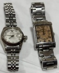 Dois relógios de pulso sendo um réplica de Rolex, ambos com pulseira em metal. (observação no estado. ).