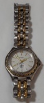 FOSSIL - Lindo relógio Fóssil, confeccionado em metal prateado e  dourado está funcionando.
