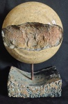 Escultura em pedra.  Med: 33X10x18cm.