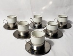 Vera Cruz, Conjunto com 6 xícaras para café produzidas em porcelana, com filetações em prata, suportes produzidos em aço, década de 70.