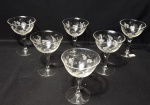 Lote contendo 6 taças produzidas em cristal, com lapidações de folhagem, maior comprimento:12cm. Alt.