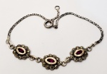 Belíssima pulseira produzida em prata de lei, com ornamentação de pedras marcassitas , zircônia rosa e filetação em ouro, comprimento aberto:21cm.
