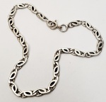 Estilosa pulseira produzida em prata de lei, comprimento aberto:20cm.