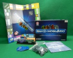 Jogo tabuleiro `Banco Imobiliário`, marca Estrela. Ano 2013.