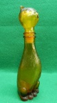 Garrafa de vinho italiano da década de 60 em formato de gato, na cor âmbar. Usado. Pequeno lascado na ponta da orelha, como pode ser visto nas fotos. 23 A x 6,5 L x 9 C
