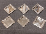 conjunto com 6 porta manteiga para serviço de mesa, banhados a prata, marca Wolf. Usados e em muito bom estado. Medidas 7 x 7 .