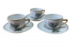 Antigo conjunto constando 3 xícaras Art Decor, anos 50, em porcelana finamente policromadas, realçadas a ouro, com decoração Floral.