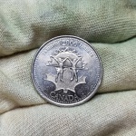 E70 - Moeda Canadá, comemorativa `Série milênio` Liberdade 2000