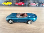 Miniatura carrinho Jaguar XK180. Com abertura das portas. Aprox. 11cm. Conforme fotos.