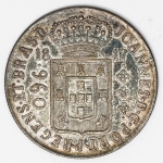 Numismática Brasil - 960 Réis, 1810 B Bahia - Peça totalmente caipira, esteve guardada por dezenas de anos. Pátina belíssima - Aguardando por ser classificada.
1817 - Rio, borda com serrilha - Cópia muito antiga.