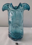 Lindo vaso em vidro de murano, anos 50, série cacto, na cor azul, bordas em movimento, decorado com bolhas internas. Altura 24cm de altura por 18cm aproximadamente.