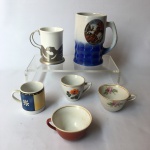 Lote com 4 xícaras e duas canecas de porcelana. Presença de desgastes. Maior peça: 13 cm.