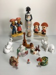 Lote com 12 miniaturas de diversos materias. Uma peça com restauro e sem as orelhas. Dimensões: 18 cm (maior peça).