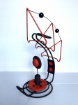 Escultura abstrata feita de madeira com detalhes nas cores preto e vermelho com belos acabamentos. Obra única, assinado HDG no fundo. Dimensões: 38 cm x 15 cm x 30 cm. Recentemente, descobri minha paixão por criar esculturas abstratas, utilizando hastes de madeira e diversos tipos de materiais. Cada peça é uma combinação única de formas e cores, onde a simplicidade do material encontra a complexidade da criatividade. Meu trabalho busca criar composições artísticas que instigam a imaginação e despertam novas perspectivas.