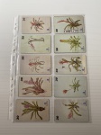 Parte de coleção com 20 cartões telefônicos.