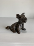 Antiga miniatura de Cão feito de metal. Sinais de desgaste. Dimensões: 8 cm x 9 cm x 5 cm.