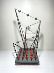 Escultura abstrata feita de madeira com detalhes nas cores preto, branco, cinza e vermelho com belos acabamentos. Obra única, assinado HDG no fundo. Dimensões: 42 cm x 24 cm x 22 cm. Recentemente, descobri minha paixão por criar esculturas abstratas, utilizando hastes de madeira e diversos tipos de materiais. Cada peça é uma combinação única de formas e cores, onde a simplicidade do material encontra a complexidade da criatividade. Meu trabalho busca criar composições artísticas que instigam a imaginação e despertam novas perspectivas.