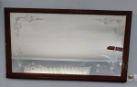Espelho de parede/móvel/pentiadeira, lapidado em flores e folhas em satiné, com moldura em madeira. Mínimas manchas causadas pelo tempo. Med. 97x55cm.