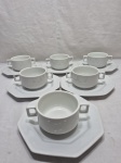 Jogo de 6 xícaras de consume em porcelana branca com pires facetado. Medindo 10cm x 6cm de altura, pires adaptado.