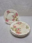 Jogo de 6 pratos de sobremsa em porcelana inglesa floral, craquelado. Medindo 17cm de diâmetro, um deles com leve bicado. Com desgate na douração.